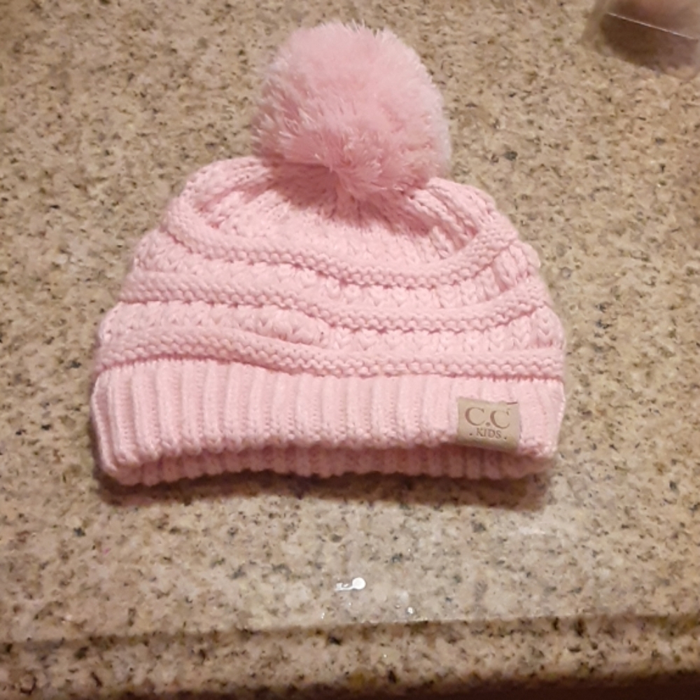 I'm selling a pink beanie.